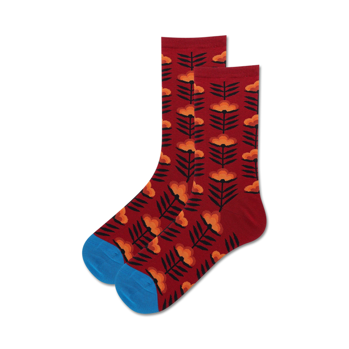 retro floral socks in orange, yellow, and green on a red background. cool women's crew socks.   
