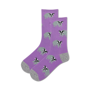 purple crew socks with gray, black, and white cartoon badgers.  