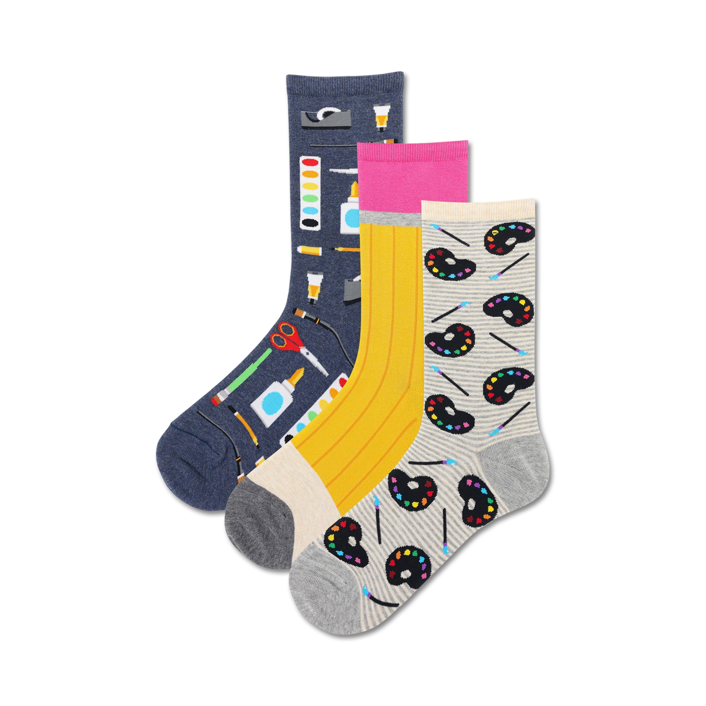 Three crew socks in a 3-pack. One navy blue sock features art supplies, one yellow sock has pencils, and one grey sock has paint palettes and brushes.