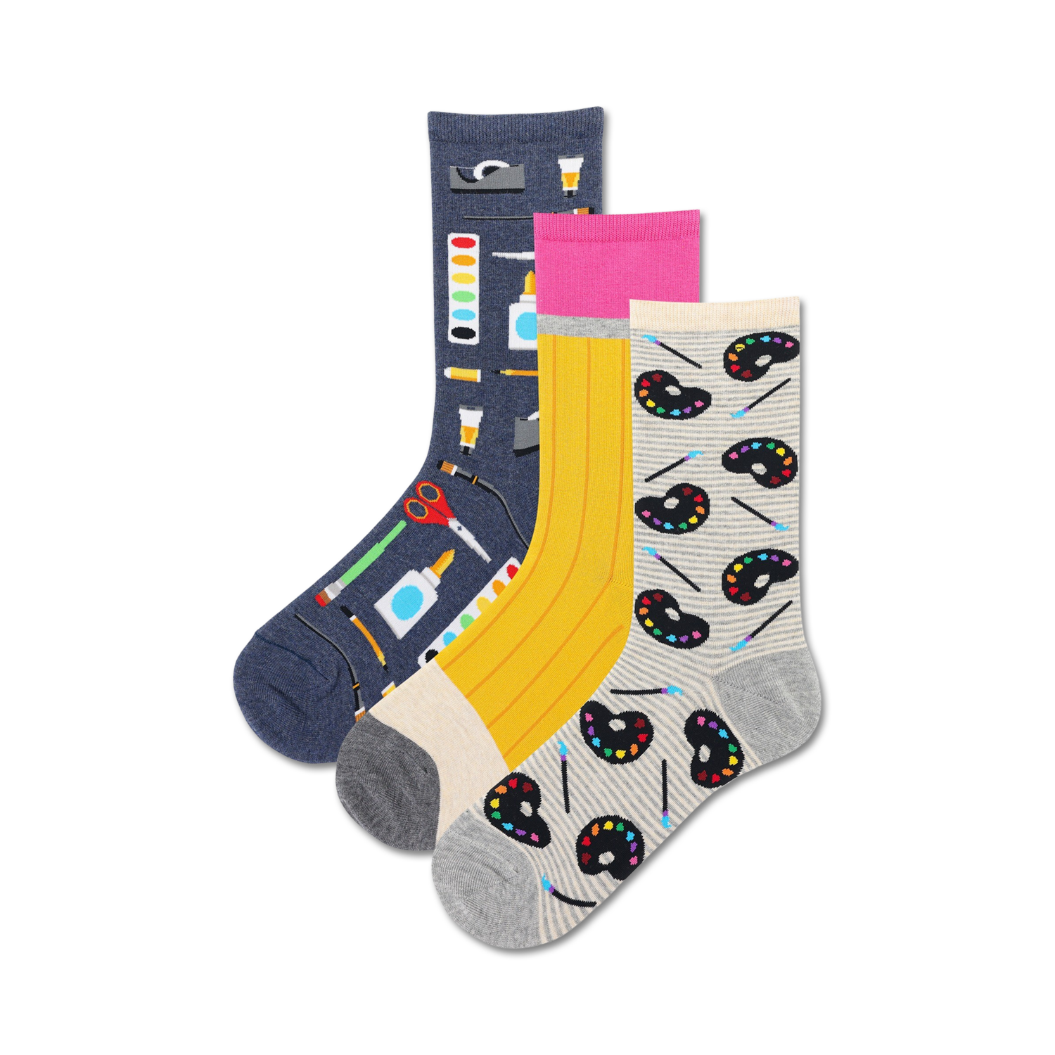 Three crew socks in a 3-pack. One navy blue sock features art supplies, one yellow sock has pencils, and one grey sock has paint palettes and brushes.