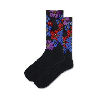 black crew socks with colorful flower pattern running up sides. womens size. floral theme.   