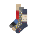 Three crew socks: one navy blue with a corkscrew design, one gray with beer mugs, and one red and blue striped.  All socks feature fun designs.
