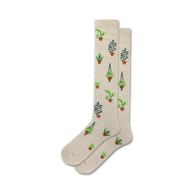 tan knee-high socks with an allover pattern of green plants in brown pots. ribbed top, reinforced heel and toe. 