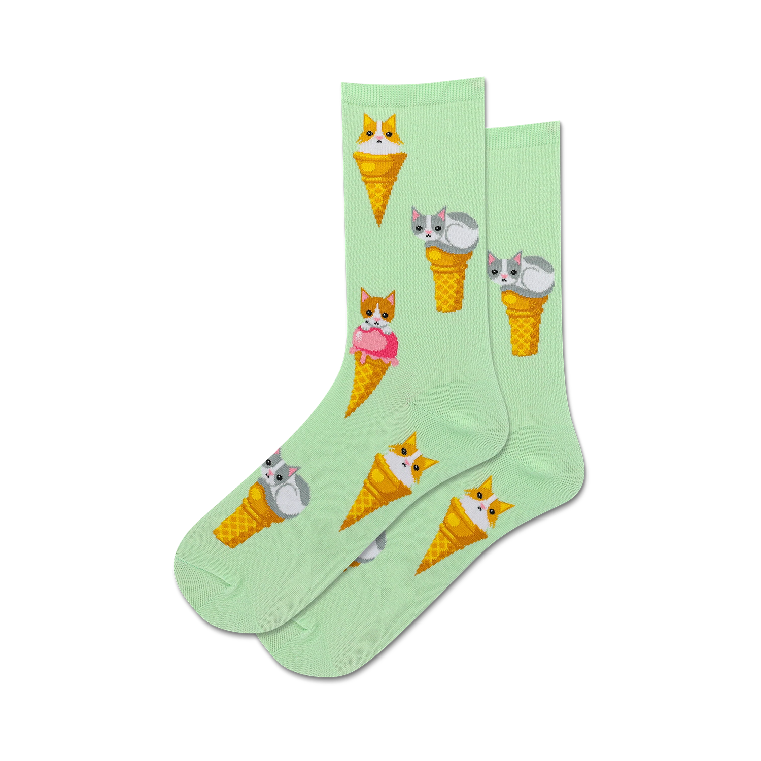 Lifestyle shot of a toddler wearing the mint green Ice Cream Cat socks.