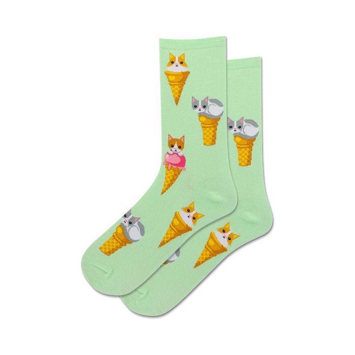 cool mint green socks with pixelated cats in ice cream cones.   