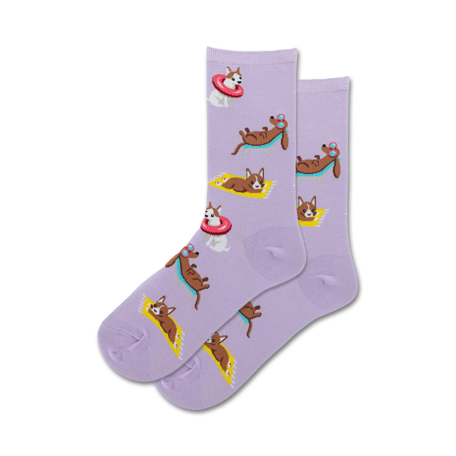 Pair of lavender crew socks with repeating pattern of cartoon dogs; some wear sunglasses, one is in a pink life preserver, and others nap on yellow towels.