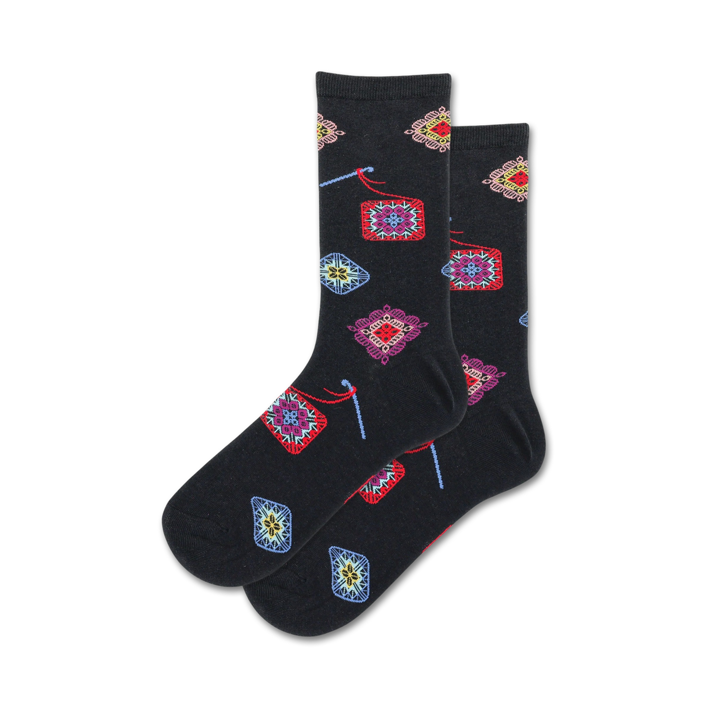 Pair of black crew socks adorned with colorful granny square and knitting needle designs.