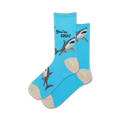Lifestyle shot showing the light blue 'You're Great' socks with shark design on a person's feet.