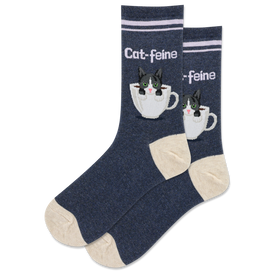 dark blue crew socks with white toe, heel, and top, featuring a design of two cute cats sitting in white coffee cups, with the text 'cat-feine' on the socks.  