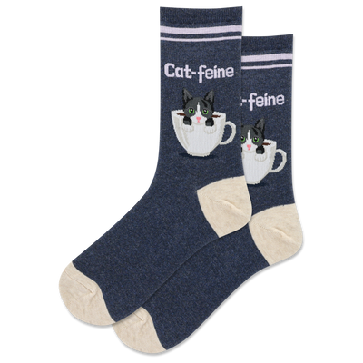 dark blue crew socks with white toe, heel, and top, featuring a design of two cute cats sitting in white coffee cups, with the text 'cat-feine' on the socks.  