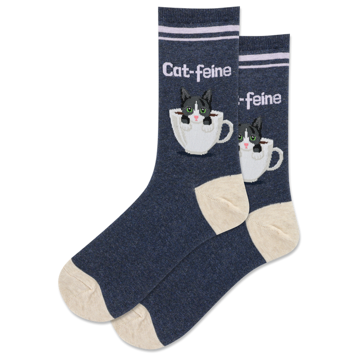 dark blue crew socks with white toe, heel, and top, featuring a design of two cute cats sitting in white coffee cups, with the text 'cat-feine' on the socks.  