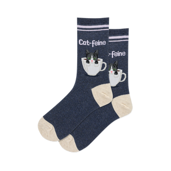 Pair of crew socks; navy blue with cream accents, featuring a tuxedo cat in a coffee cup graphic and 'Cat-feine' text.