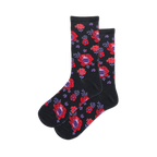 Pair of women's crew socks in black and red, featuring a poppy floral print. 