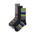 Three crew socks: one gray with orange turtles, one black with gray stripes, and one black with green, gray, and blue stripes.