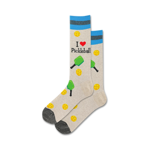 gray crew socks featuring a pattern of green pickleball paddles, yellow pickleballs, and 