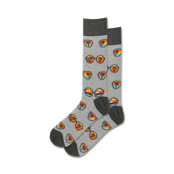 gray crew length men's socks with a pattern of sunglasses and palm trees.   