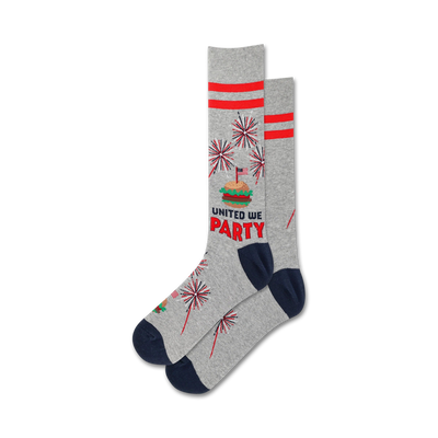 gray crew socks with red and blue striped cuffs, american flag hamburger and fireworks pattern, "united we party" text. perfect for 4th of july celebrations.   