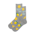 Pair of grey crew socks with yellow lemons and the text 'Squeeze the Day' in light teal. 