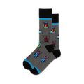 Lifestyle shot showing the gray 'Bugs' socks on a person's feet. The model appears to be wearing jeans and the setting looks casual.