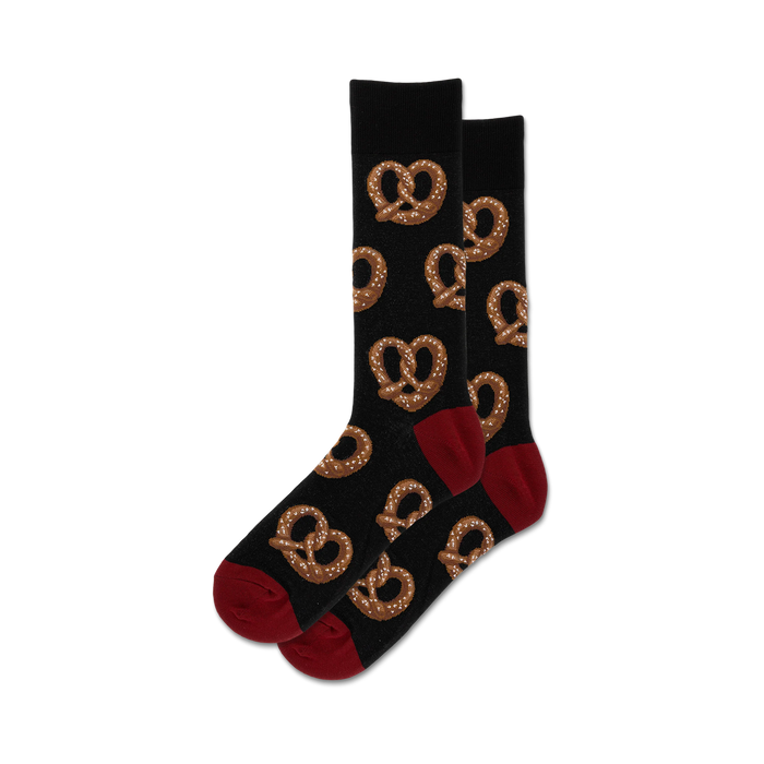 black crew socks with red toe and heel with a pattern of pretzels }}