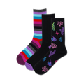 Three crew socks: one striped in purple, pink, teal and gray; two black socks with colorful coral, seaweed and fish designs.