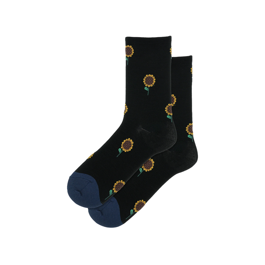 Pair of black crew socks with small sunflower designs.  Navy blue cuffs.  Cute and comfy!