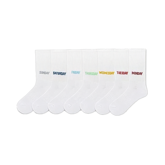 Seven white crew socks, each embroidered with a different colorful day of the week. }}
