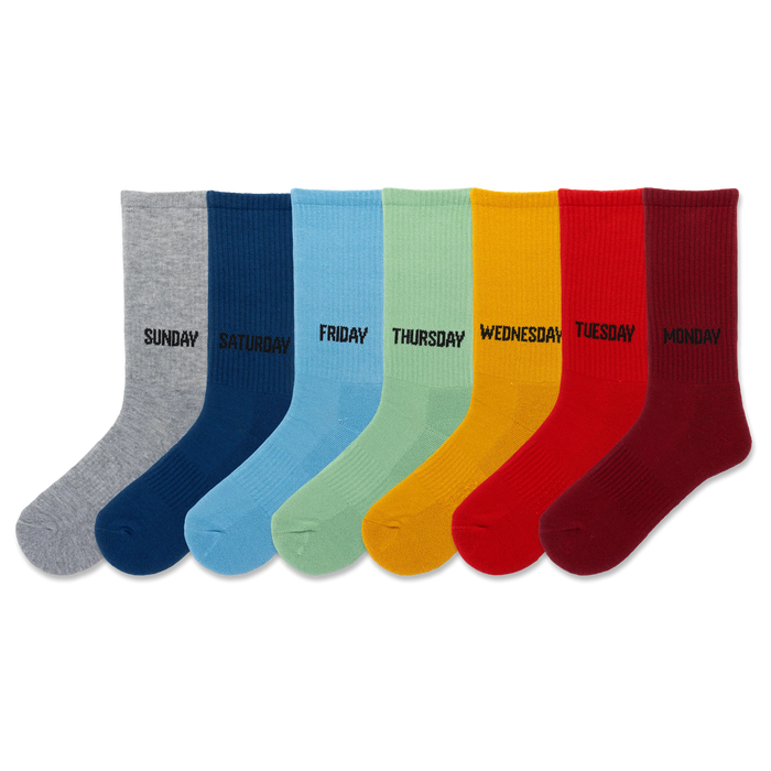 seven (7) pair crew length socks in different colors with days of the week text in black.    }}