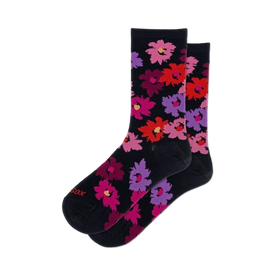 womens tropical floral crew socks with vibrant colors and playful patterns of various tropical flowers on a black background.  