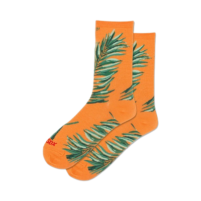 orange women's crew socks with a palm leaf pattern.  