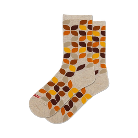 women's leafy geo crew socks: overlapping leaf pattern in brown, orange on beige background.   