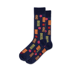dark blue crew socks with cartoon tikis and hibiscus flowers in orange, yellow, green, and pink.   