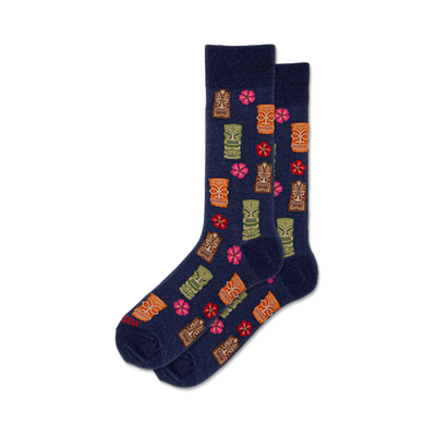 dark blue crew socks with cartoon tikis and hibiscus flowers in orange, yellow, green, and pink.   