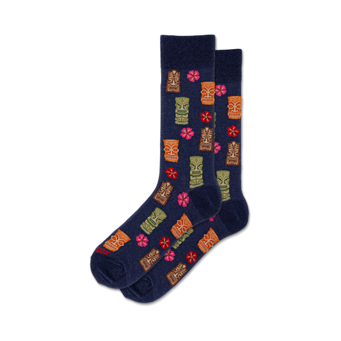 dark blue crew socks with cartoon tikis and hibiscus flowers in orange, yellow, green, and pink.    }}