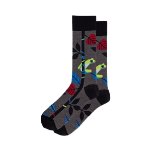 mens crew socks with colorful tree frog, leaves, vine pattern on dark gray background. 