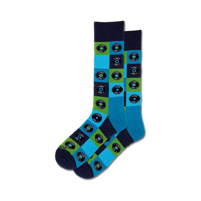 dark blue crew socks with multicolored record pattern, featuring green cuff and blue toe and heel.   }}
