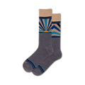 Pair of gray crew socks with a colorful sunrise design. The design includes shades of blue, beige, and orange, with geometric sun rays.