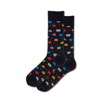 black crew socks featuring a colorful pattern of 8-bit alien robots.  