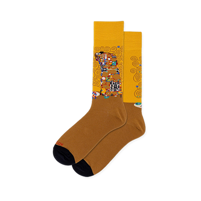 Yellow crew socks featuring Klimt's Fulfillment artwork of an embracing couple, paired with a solid tan foot and black toe.