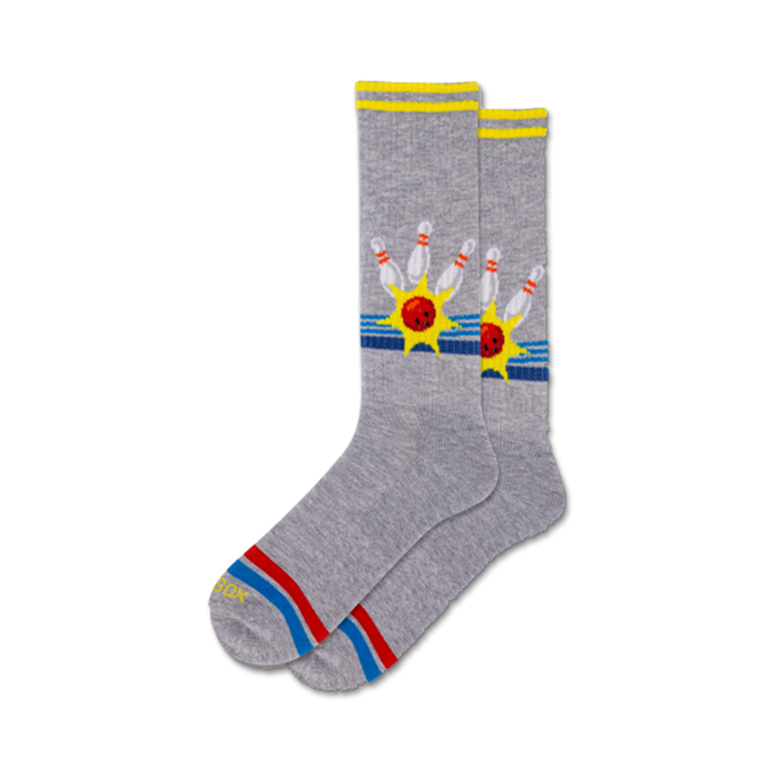 mens crew socks in gray feature red bowling balls and yellow bowling pins with blue starbursts and red, blue, and yellow stripes.   }}