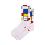 Pair of white crew socks with a Mondrian-inspired geometric design in red, blue, yellow, and grey blocks.