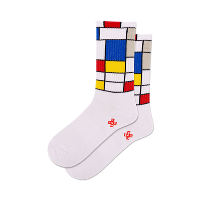 front view of a pair of white socks with red, yellow, blue, and grey mondrian-inspired squares.