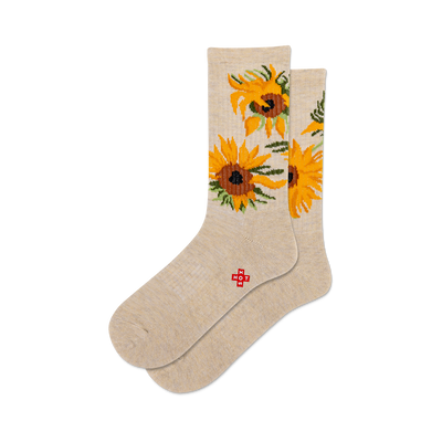 a front view of two pairs of beige socks with sunflower designs inspired by van gogh's artwork.