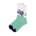 Pair of crew socks with a design featuring Van Gogh's Irises in shades of blue and purple on a white and light green background. Dark navy blue heel and toe.