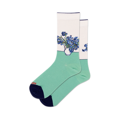 front view of a pair of blue and white crew socks with a painting of irises.