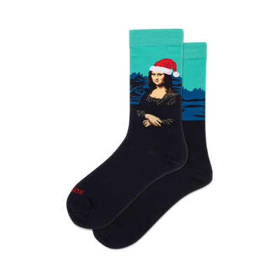 front view of a pair of black socks with a design of mona lisa wearing a santa hat.