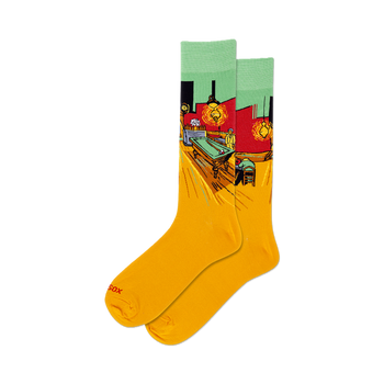 front view of a pair of yellow socks with a print of van gogh's night cafe scene.