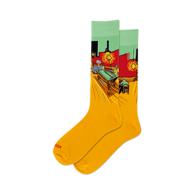 front view of a pair of yellow socks with a print of van gogh's night cafe scene.