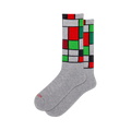 Pair of gray crew socks with a Mondrian-inspired geometric design in red, green, and black on gray background.