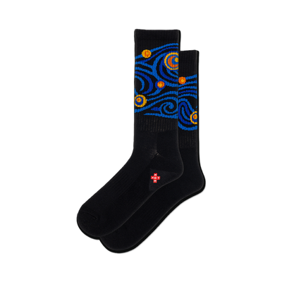 front view of two black socks featuring a blue and yellow starry night design.